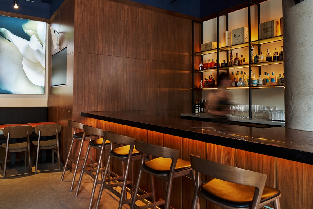 modern craft bar counter with professional setup and bottles