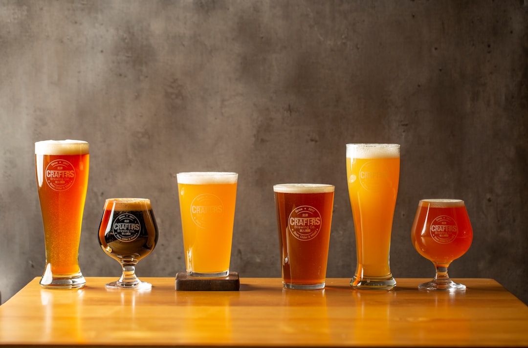 Craft beer flight with multiple glasses of different colored beers